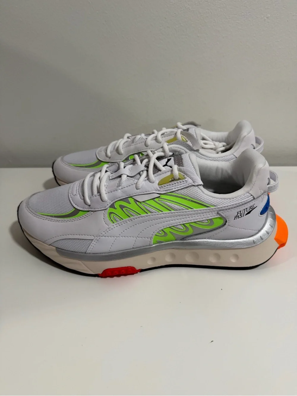 Puma White Sneakers with Neon Green and Orange Accents